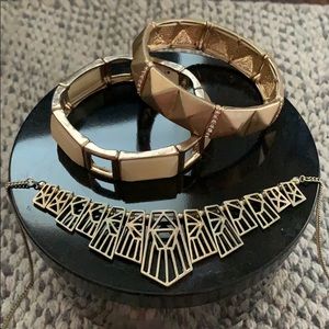 Two adjustable bracelets and necklace